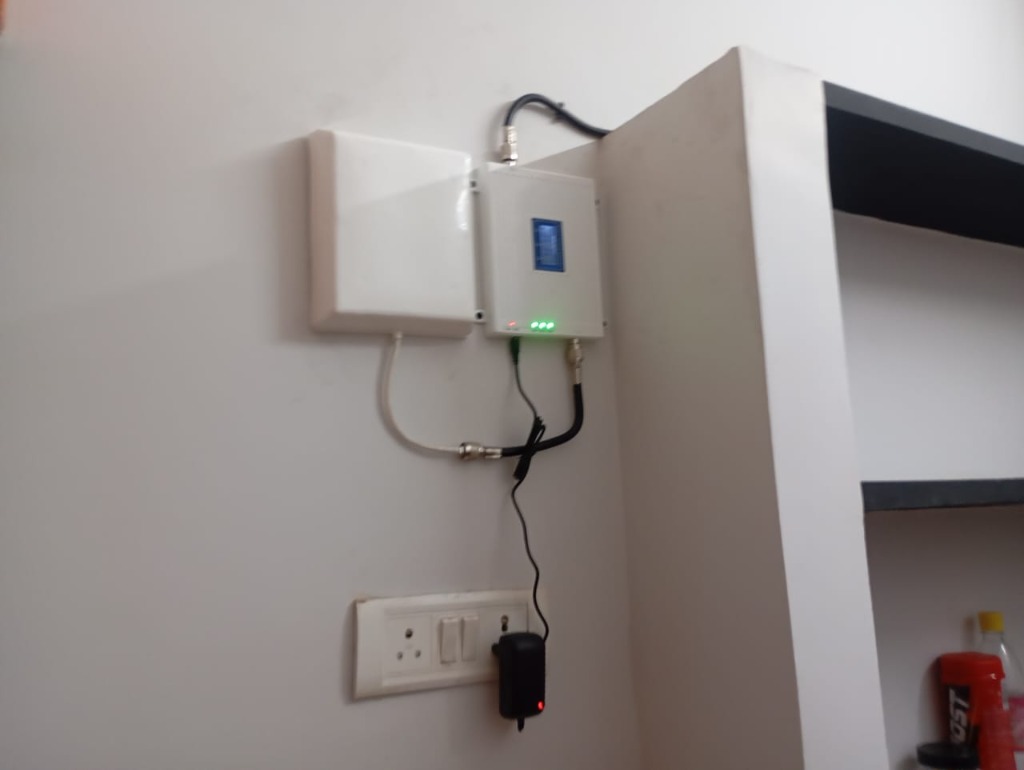 Signal booster repeater and wall panel mounting